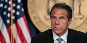 Andrew Cuomo wears suit and tie: New York Governor Andrew Cuomo.  Jeenah Moon / Getty Images